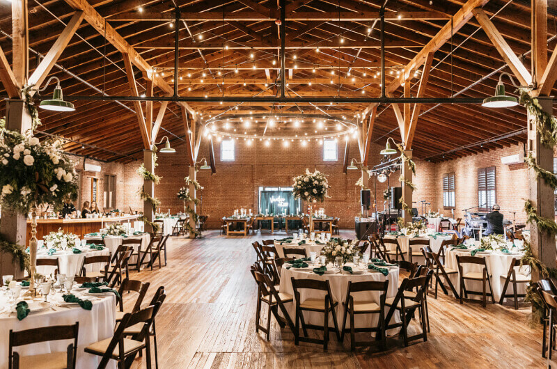 Wedding reception decorations inside industrial wedding venue