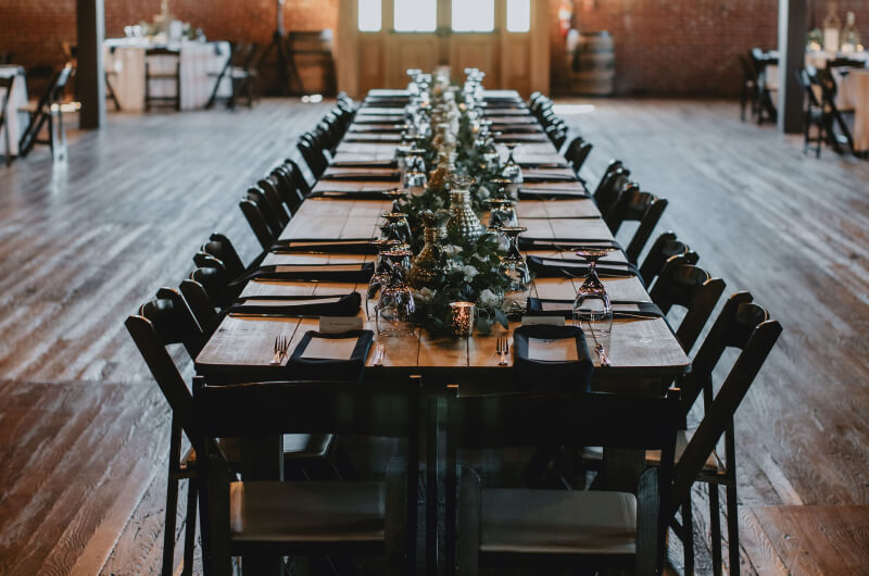 Table decorations in industrial wedding venue reception space in Gainesville