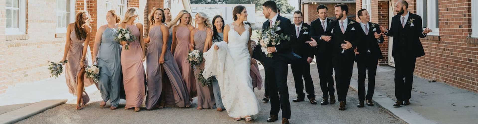 Bridal party posing for pictures after Gainesville wedding at The Chair Factory