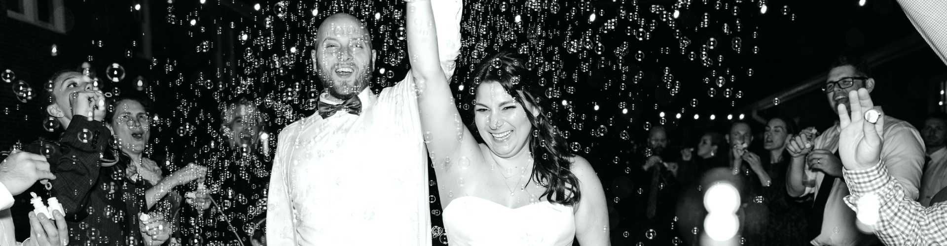 Bride and groom leaving the wedding with bubbles at a Gainesville wedding venue