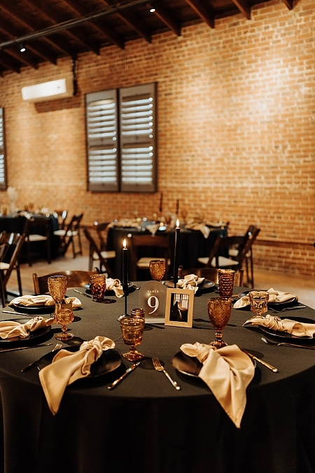 Black, Cream, and Amber Wedding Table Decor